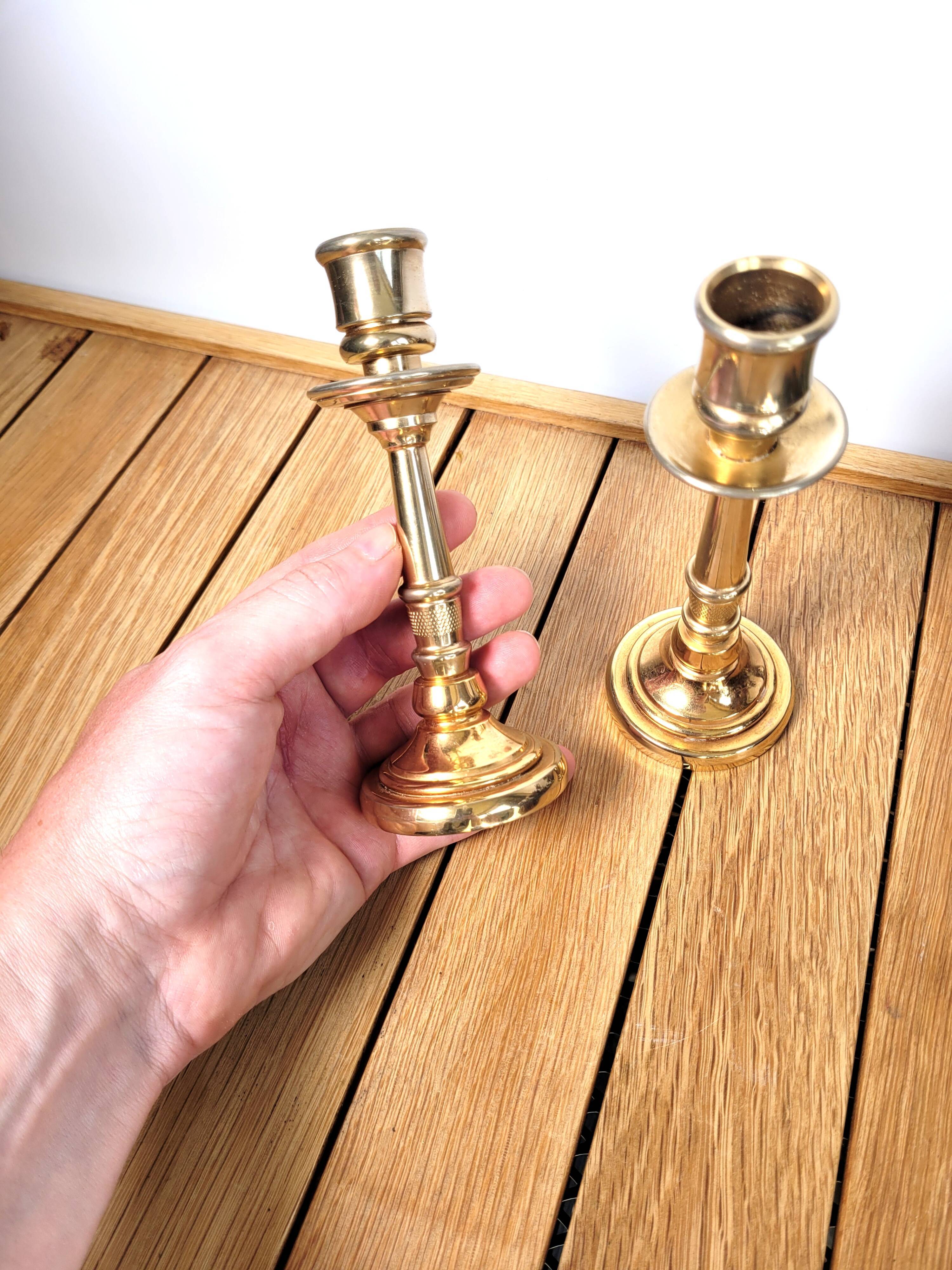 Pair of candle holders in solid gilded metal