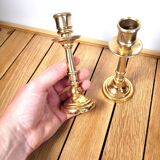 Pair of candle holders in solid gilded metal
