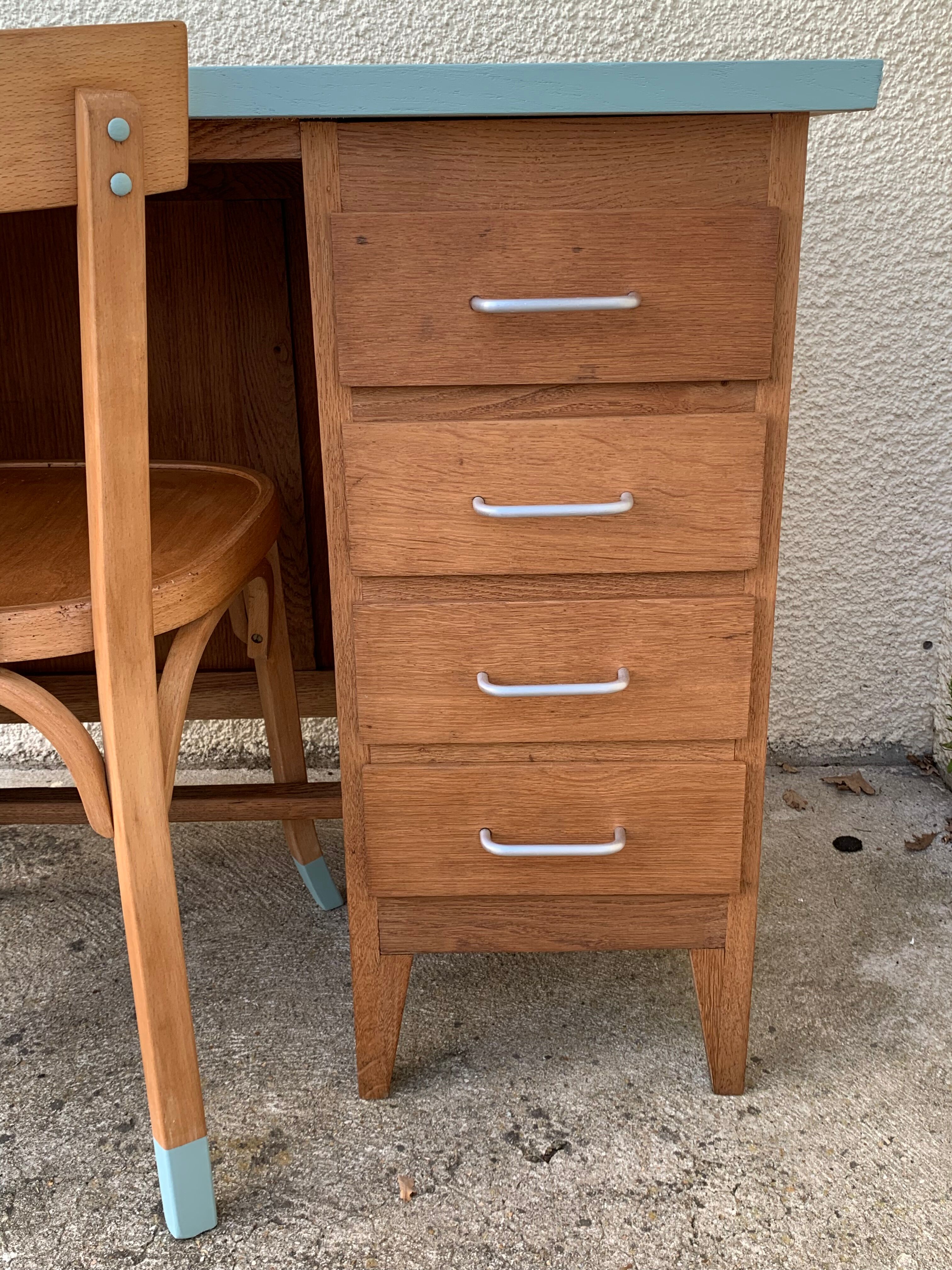 Vintage desk compass feet 1950 and its Baumann chair