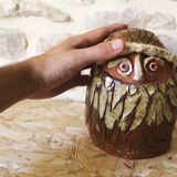 Enamelled terracotta head signed