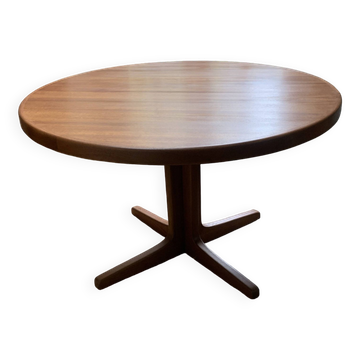 Round teak table with central leg and extension. Denmark 1960