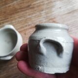 Set of 2 small glazed beige stoneware pots with handles