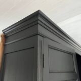 Large black wooden wardrobe