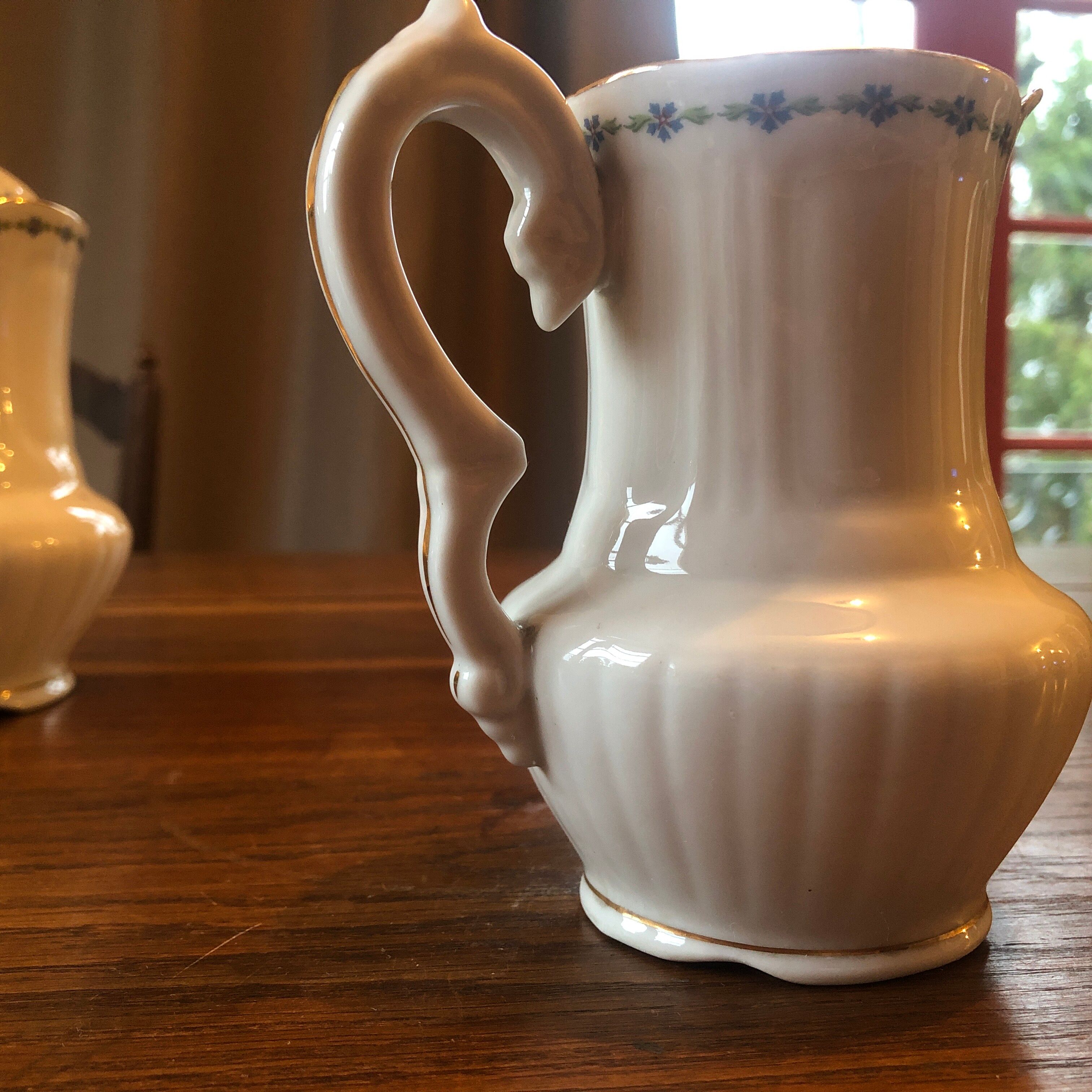 Old milk jug limoge