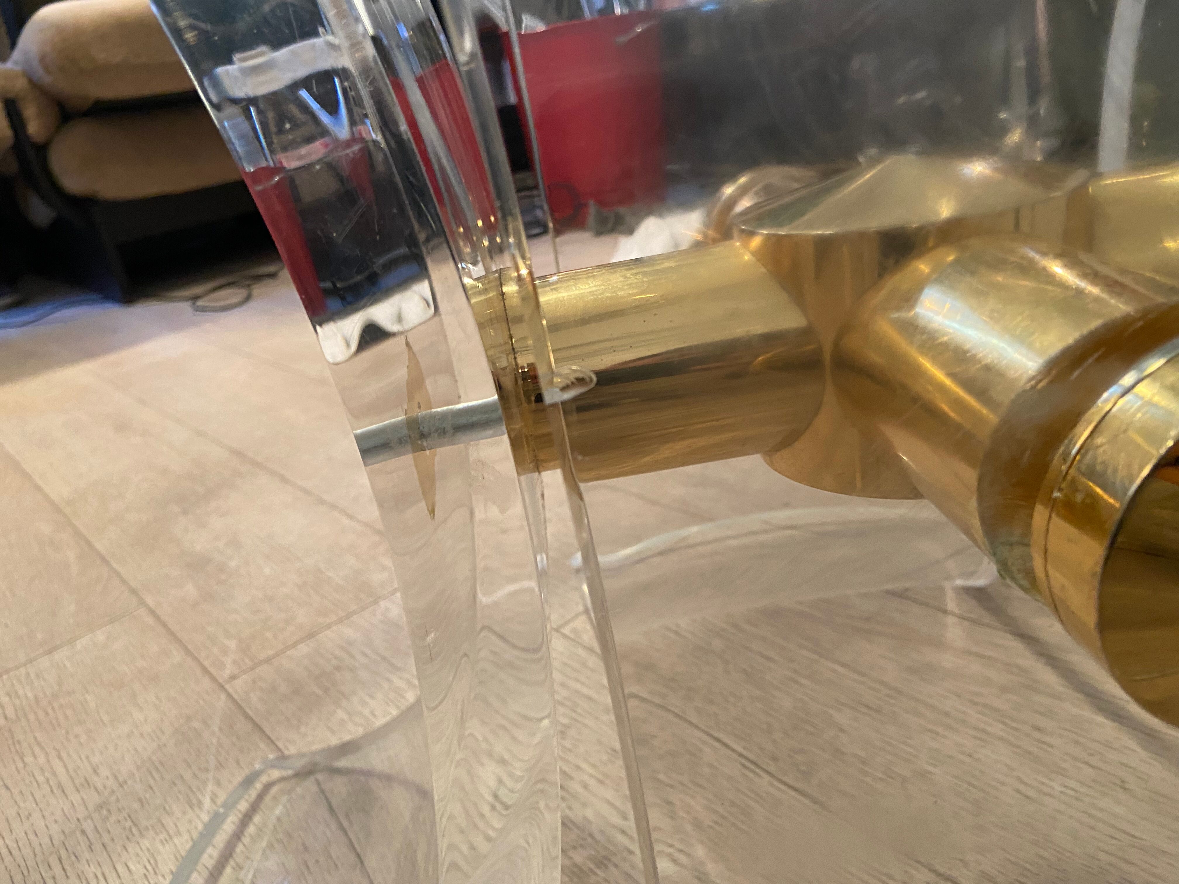 Lily table in plexiglass and gilded metal, 1970