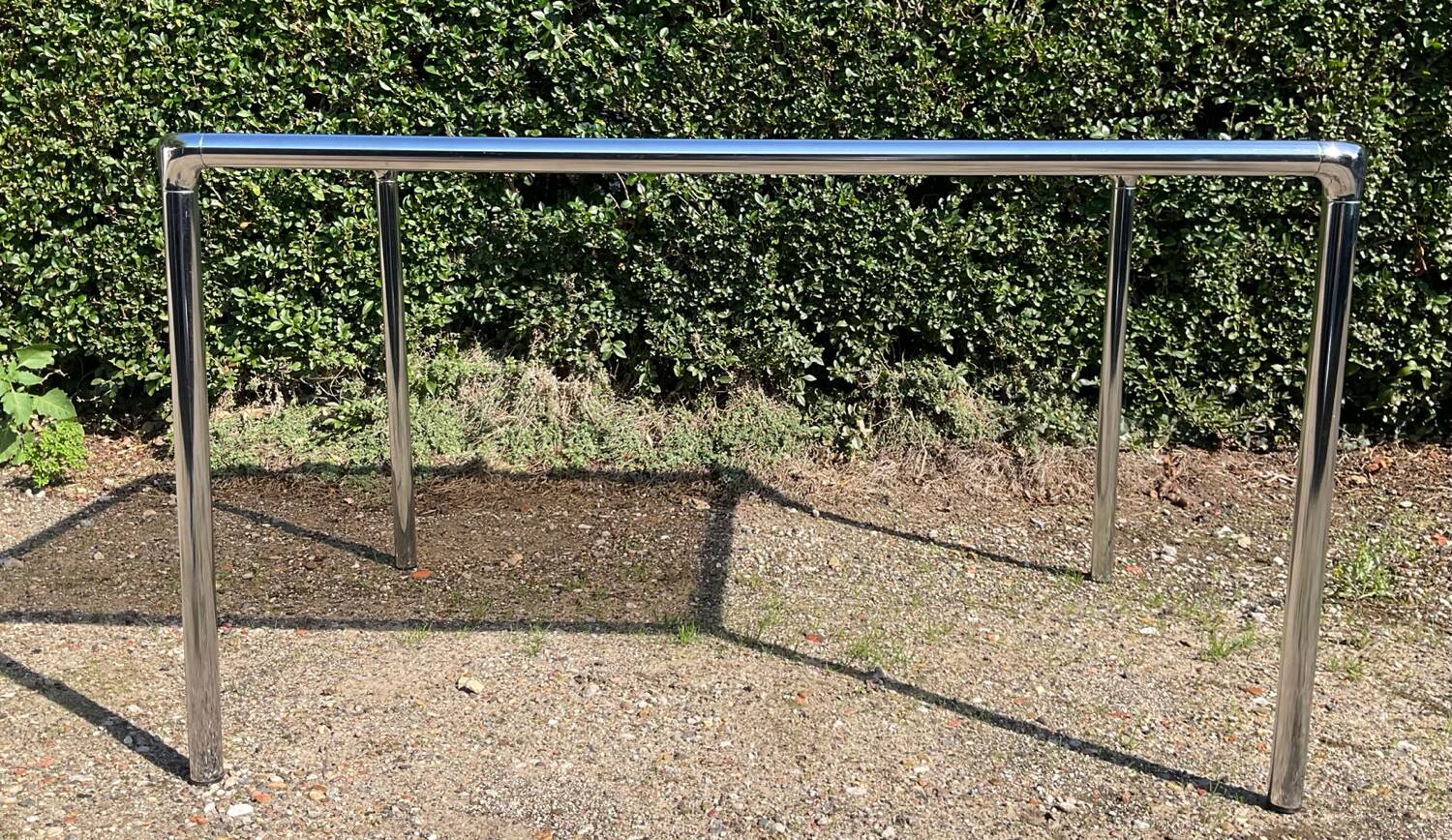 70s dining table in tubular chrome metal and smoked glass