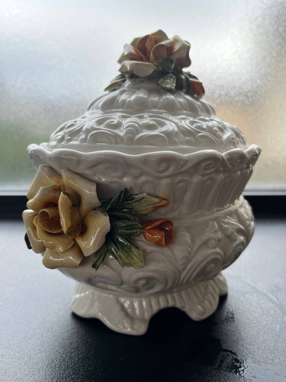 Capodimonte-style porcelain lidded sugar bowl with floral relief