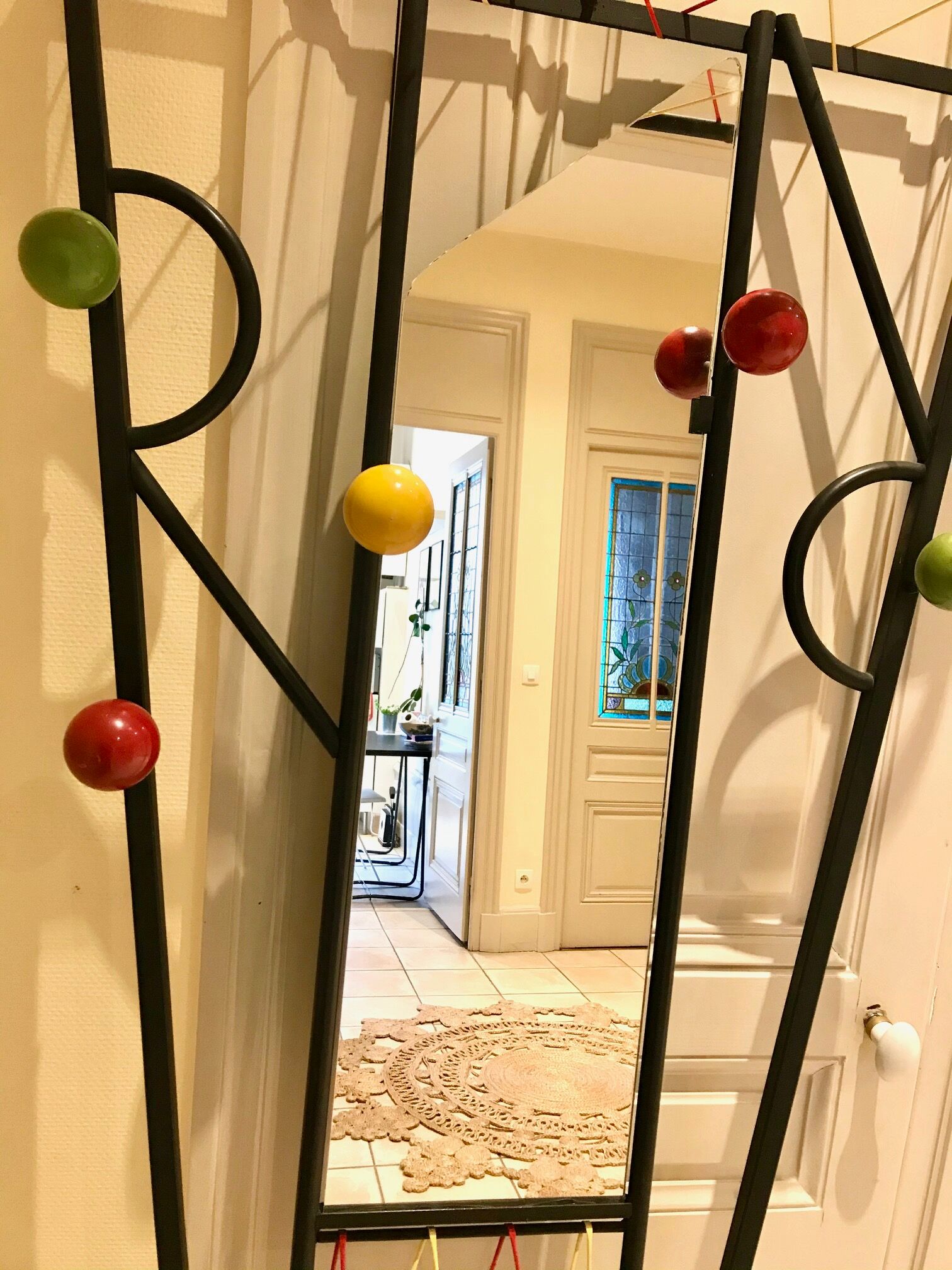 60s wall dressing room door, with colorful balls