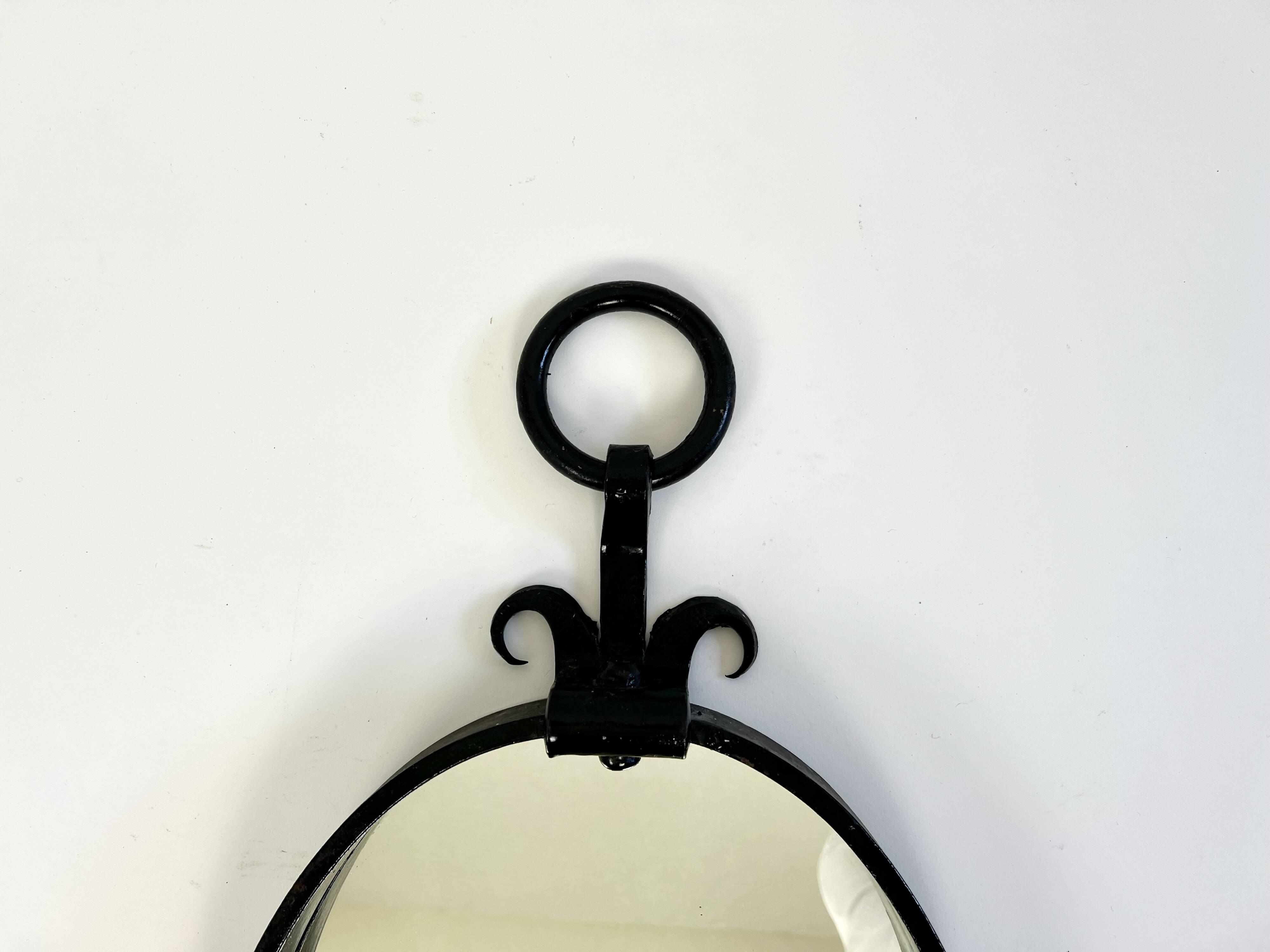 Miroir mural ovale brutaliste du milieu du siècle