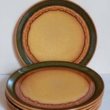 Six vintage stoneware plates with green net