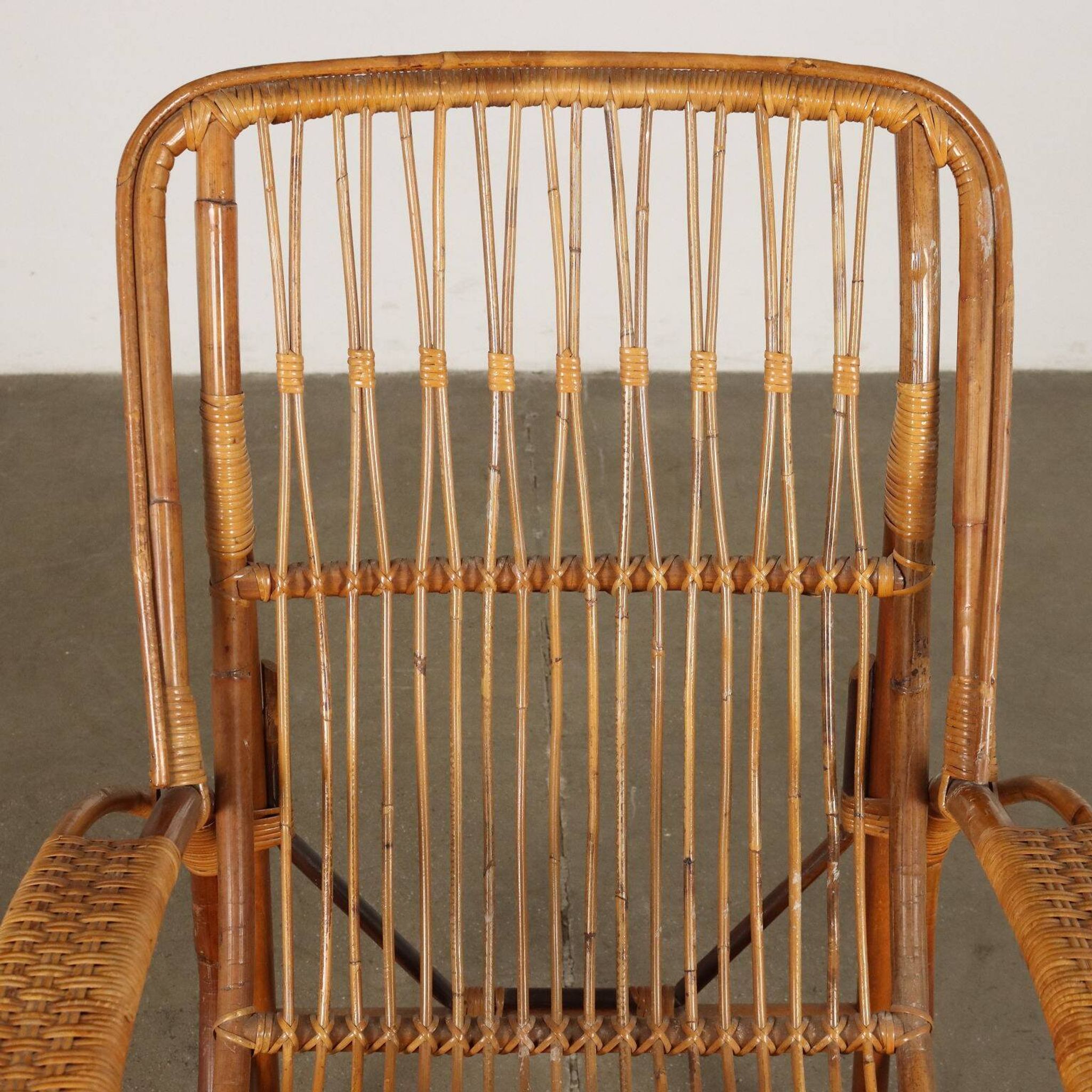 Vintage wicker armchair with magazine rack, Italy, 1960s