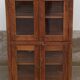 Old wooden display cabinet with three glazed sides