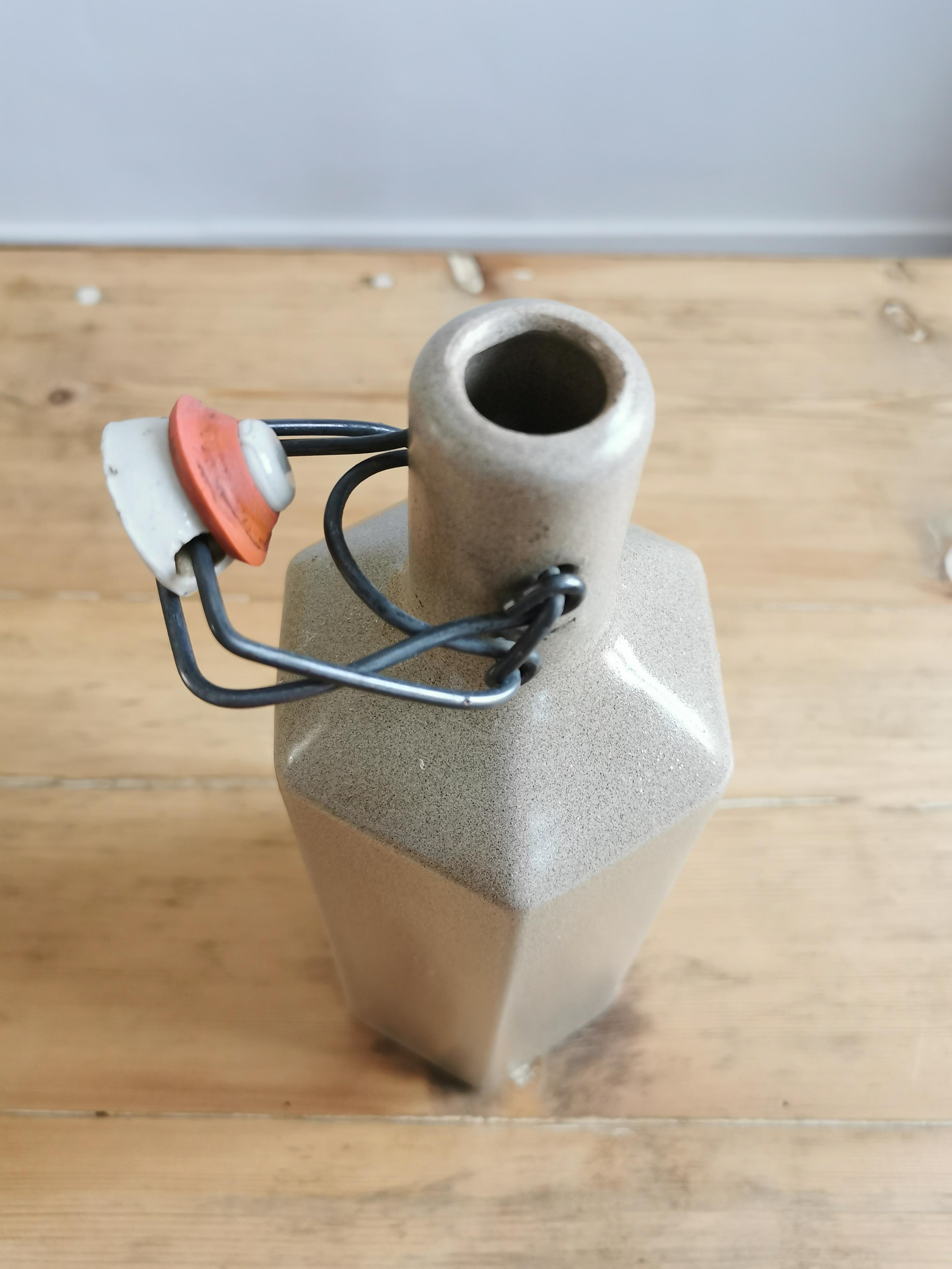 Hexagonal sandstone bottle