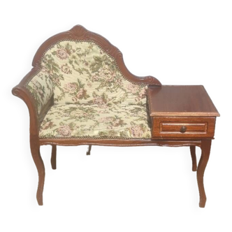 Pretty telephone unit with its vintage fabric armchair seat