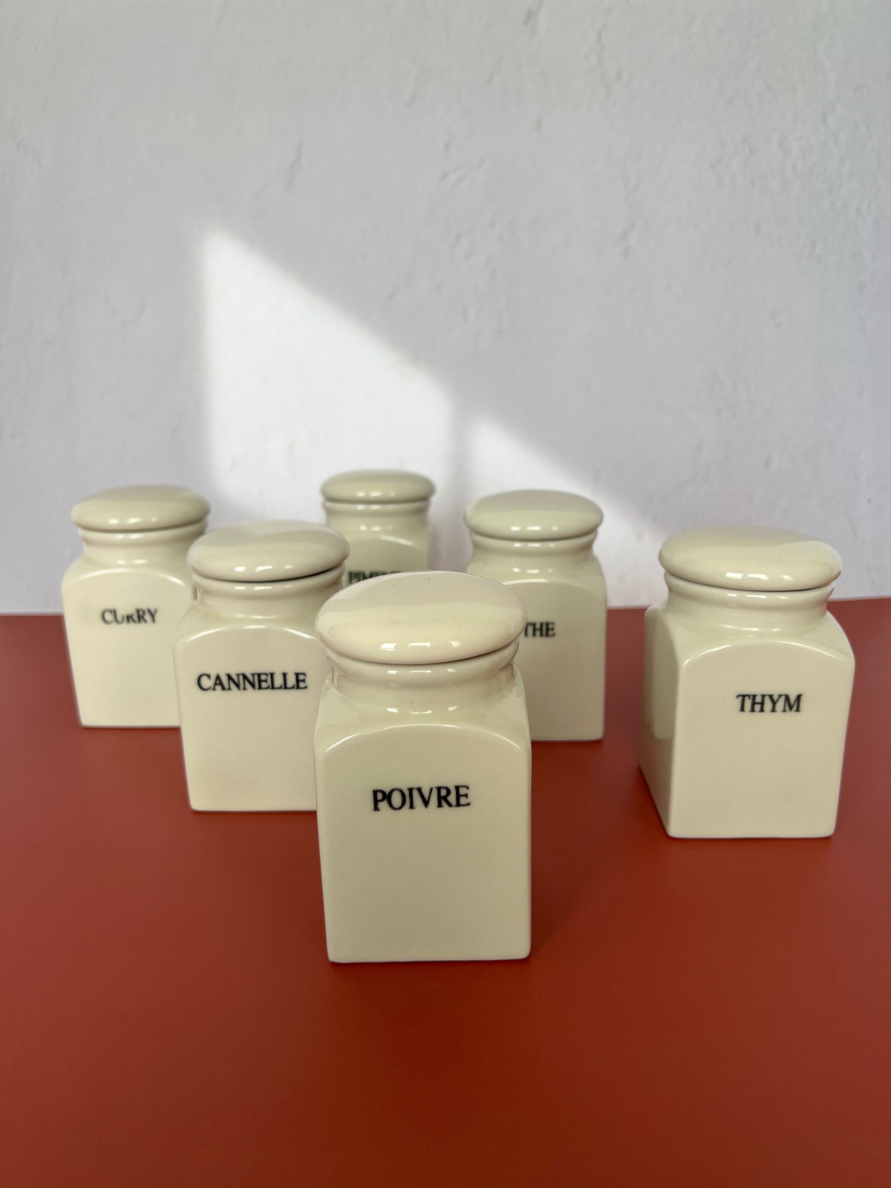 Set of vintage porcelain spice jars