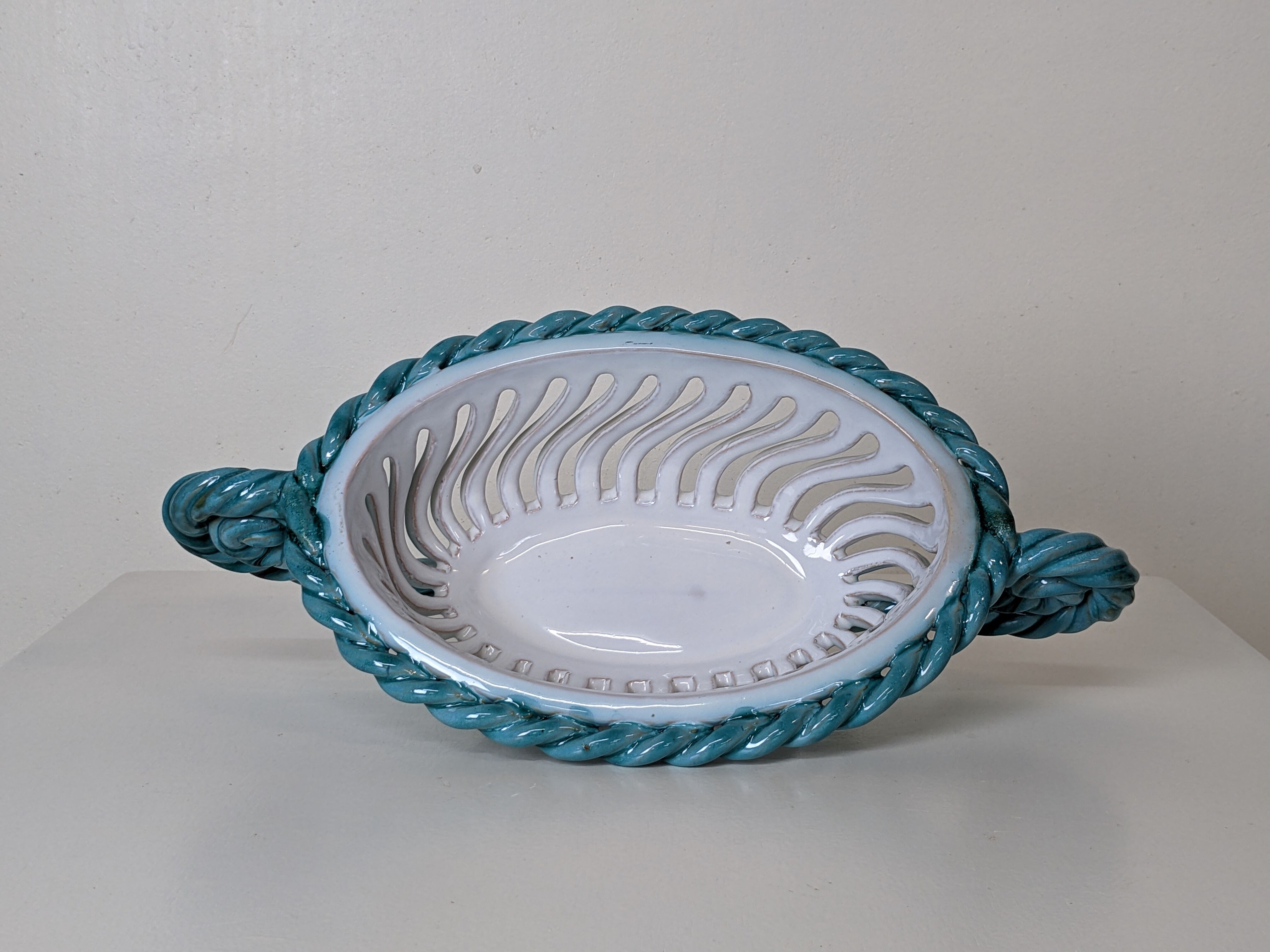 Set of 2 twisted earthenware fruit baskets by Sainte Radegonde, 50s