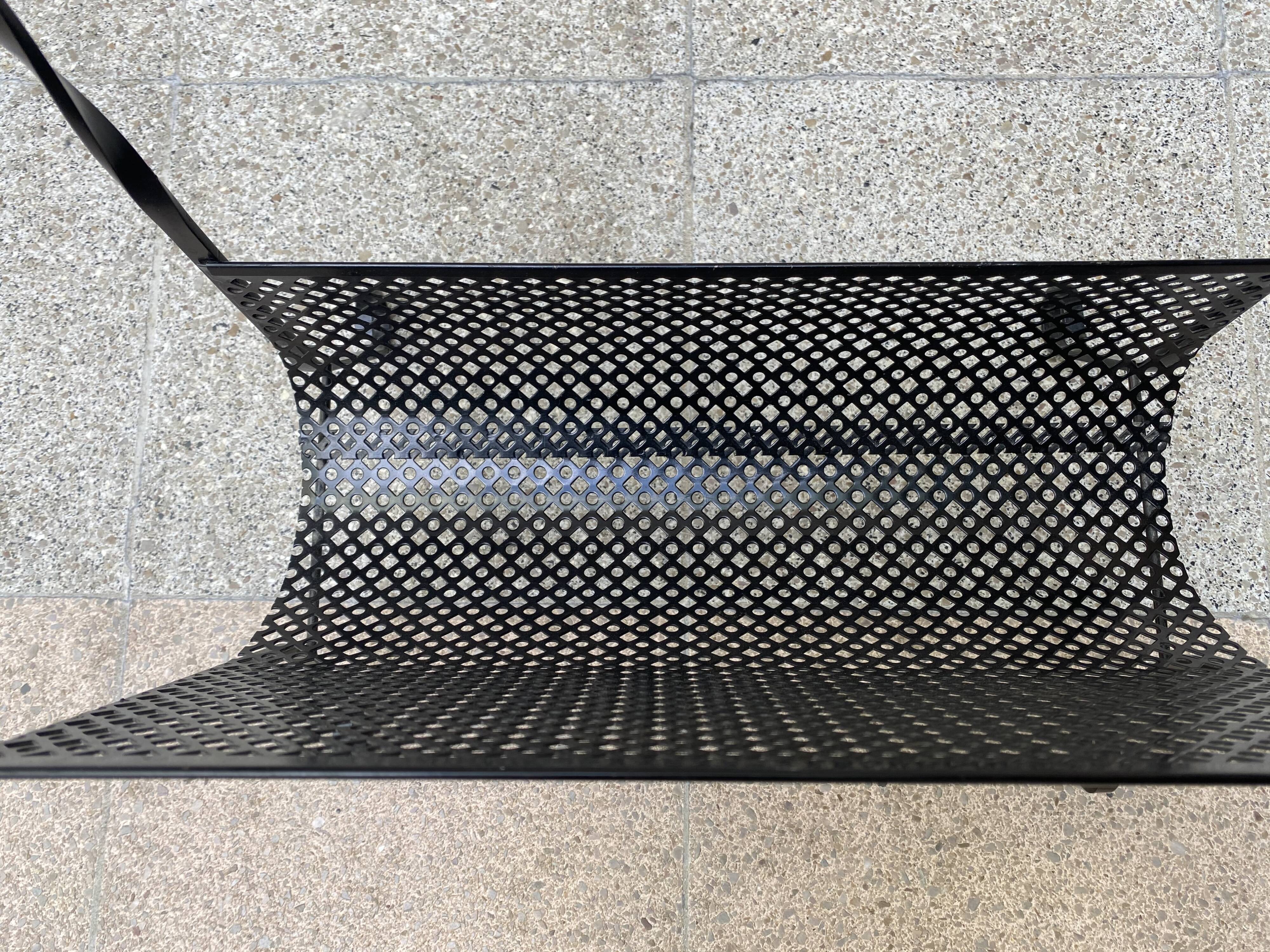 Perforated metal magazine holders - 1975