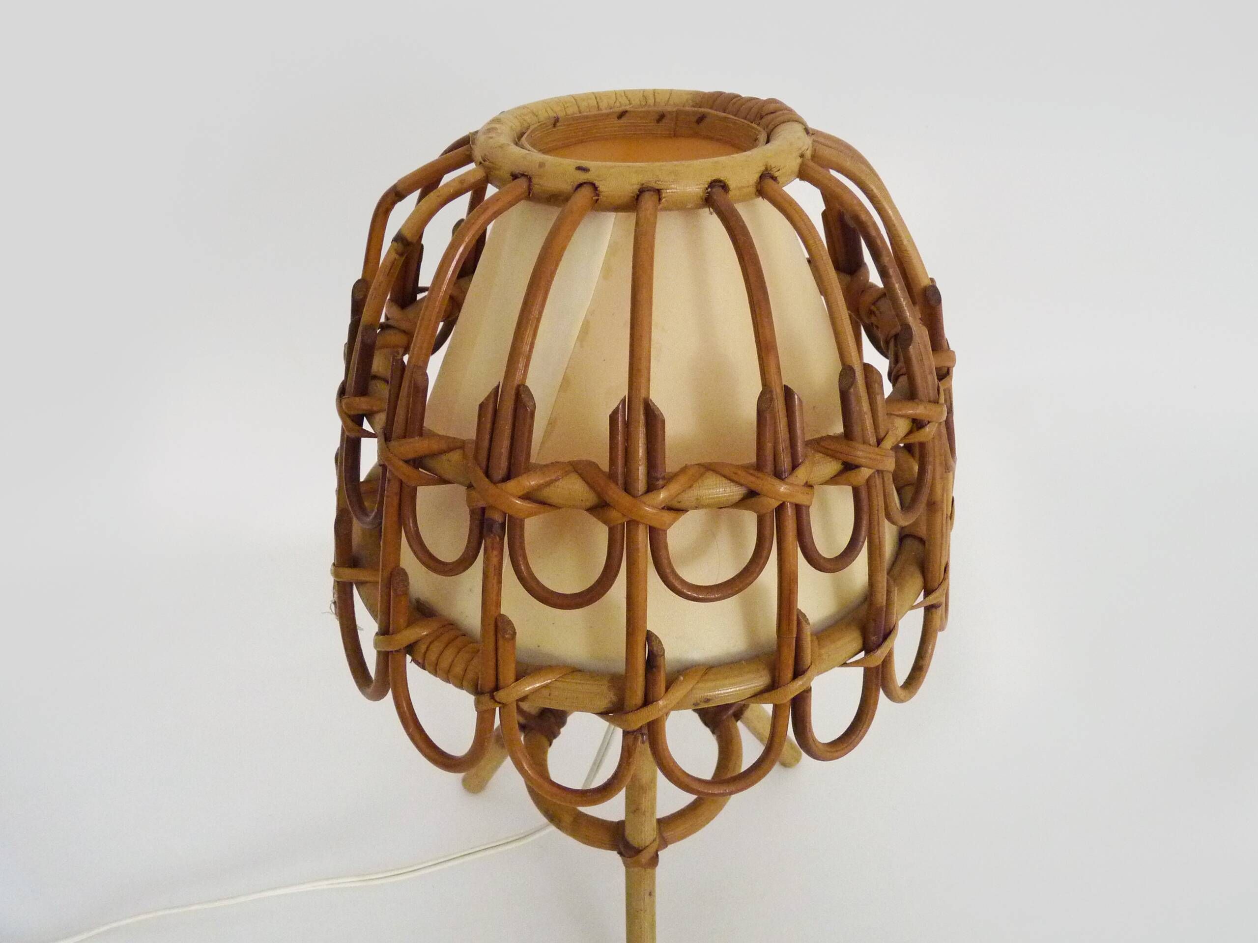 Rattan lamp in the style of Louis Sognot from the 1950s.