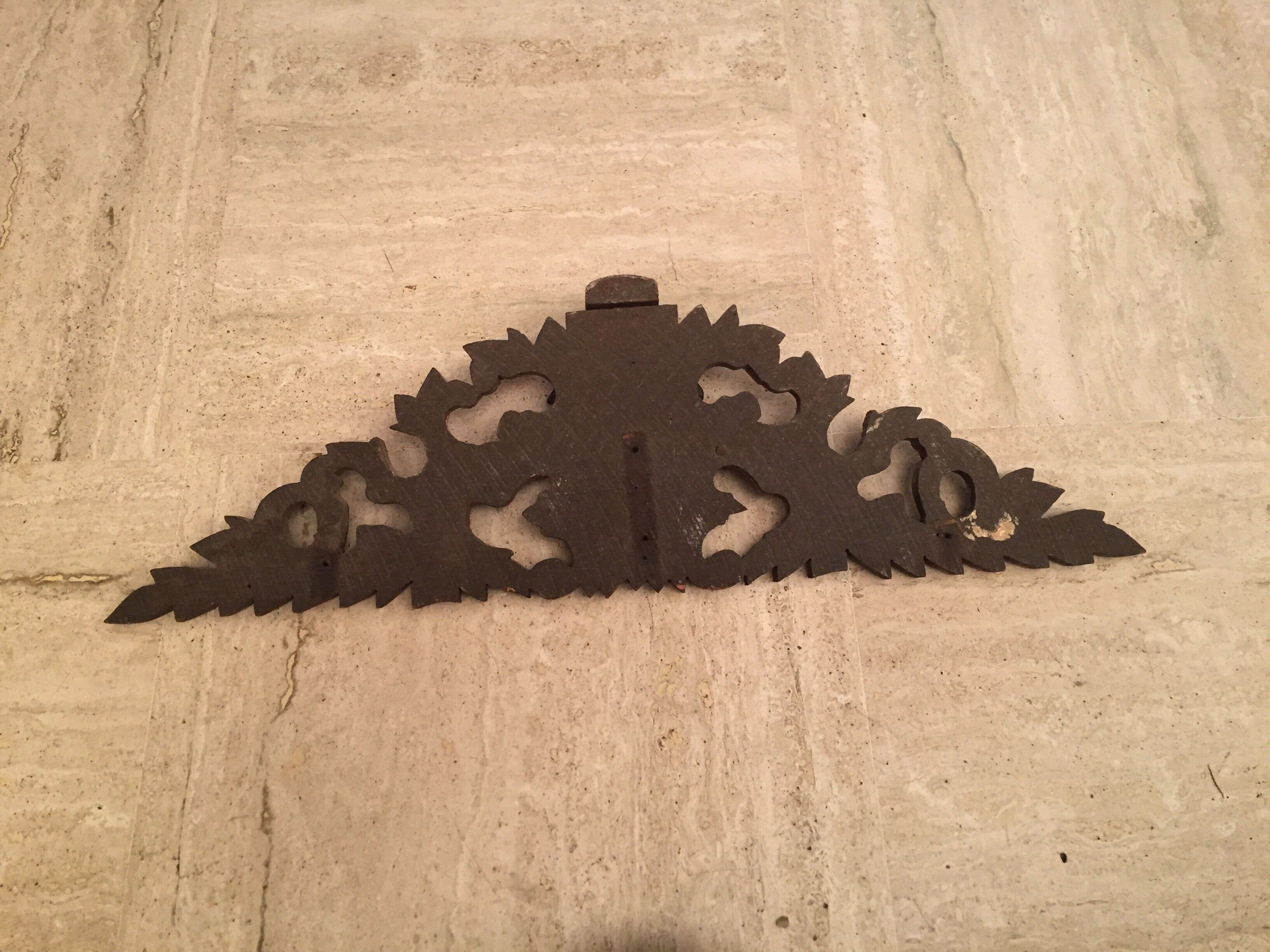 Former finely carved wooden pediment