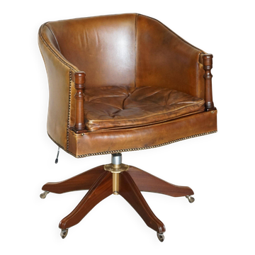 Vintage Patinated Leather Chesterfield Swivel Captain's Armchair