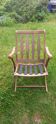Folding wooden armchair