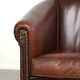 Set of 2 sheepskin club armchairs in a dark cognac colour