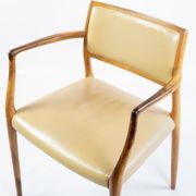 Pair of N.O. Moeller armchairs, model 65, in rosewood and light leather