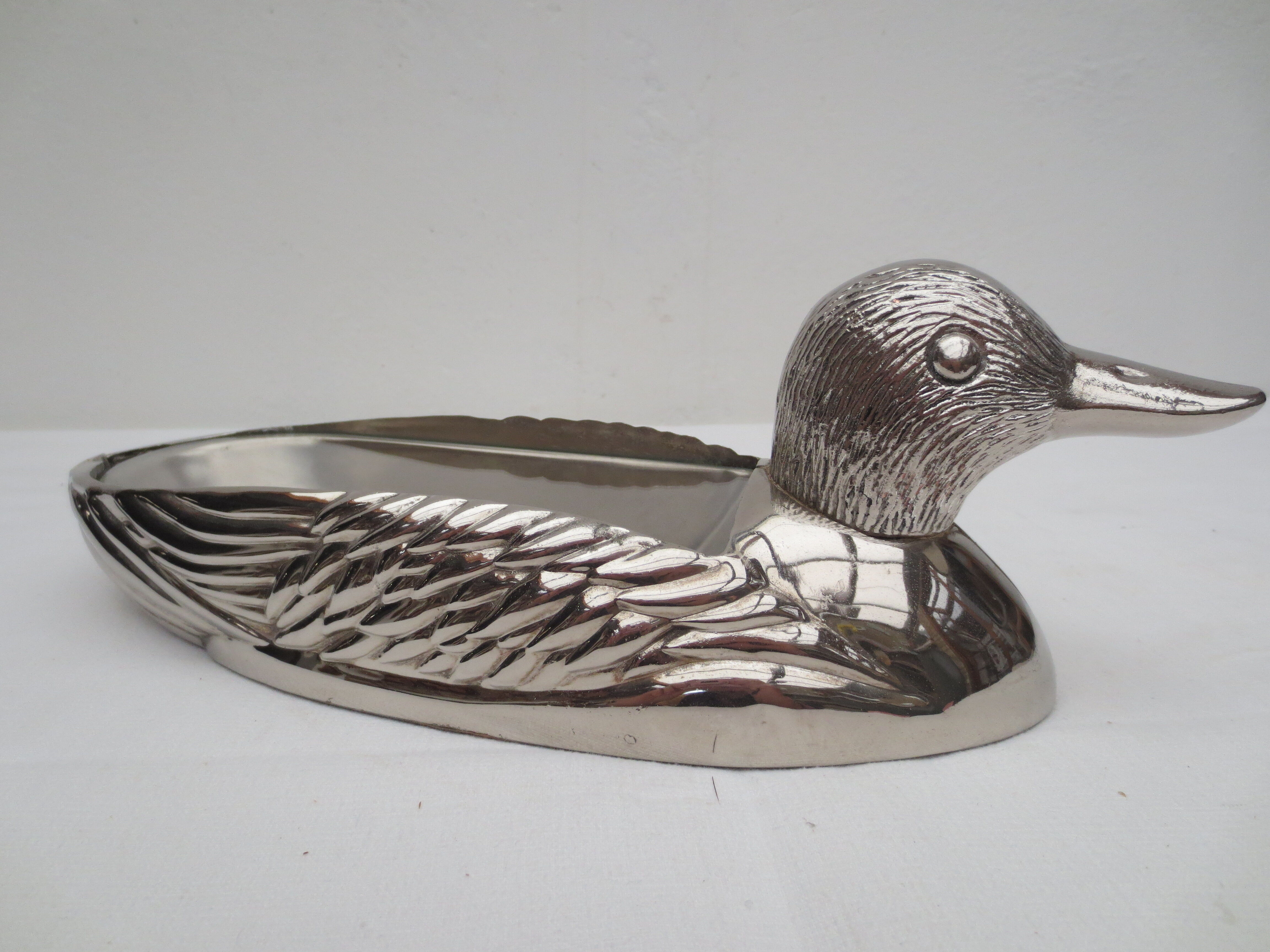 Foie gras dish in silver metal, duck décor