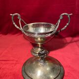 Antique sugar bowl on a stand with a lid and interior lining in velvet.