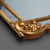 Richly decorated wall mirror in resin with golden ornaments and smoked mirror glass panels, Belgium,