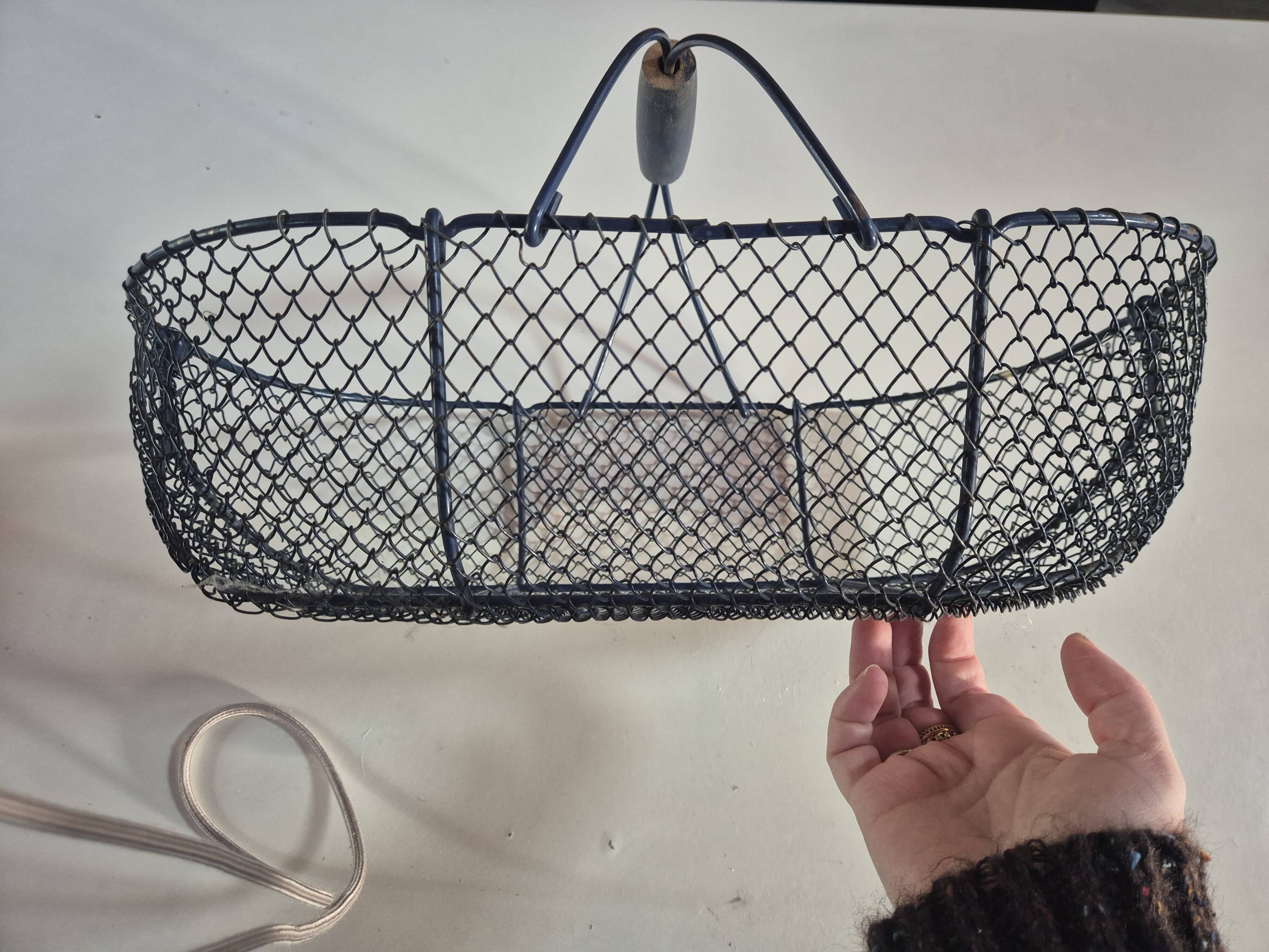 Vintage navy blue metal basket with wooden handle