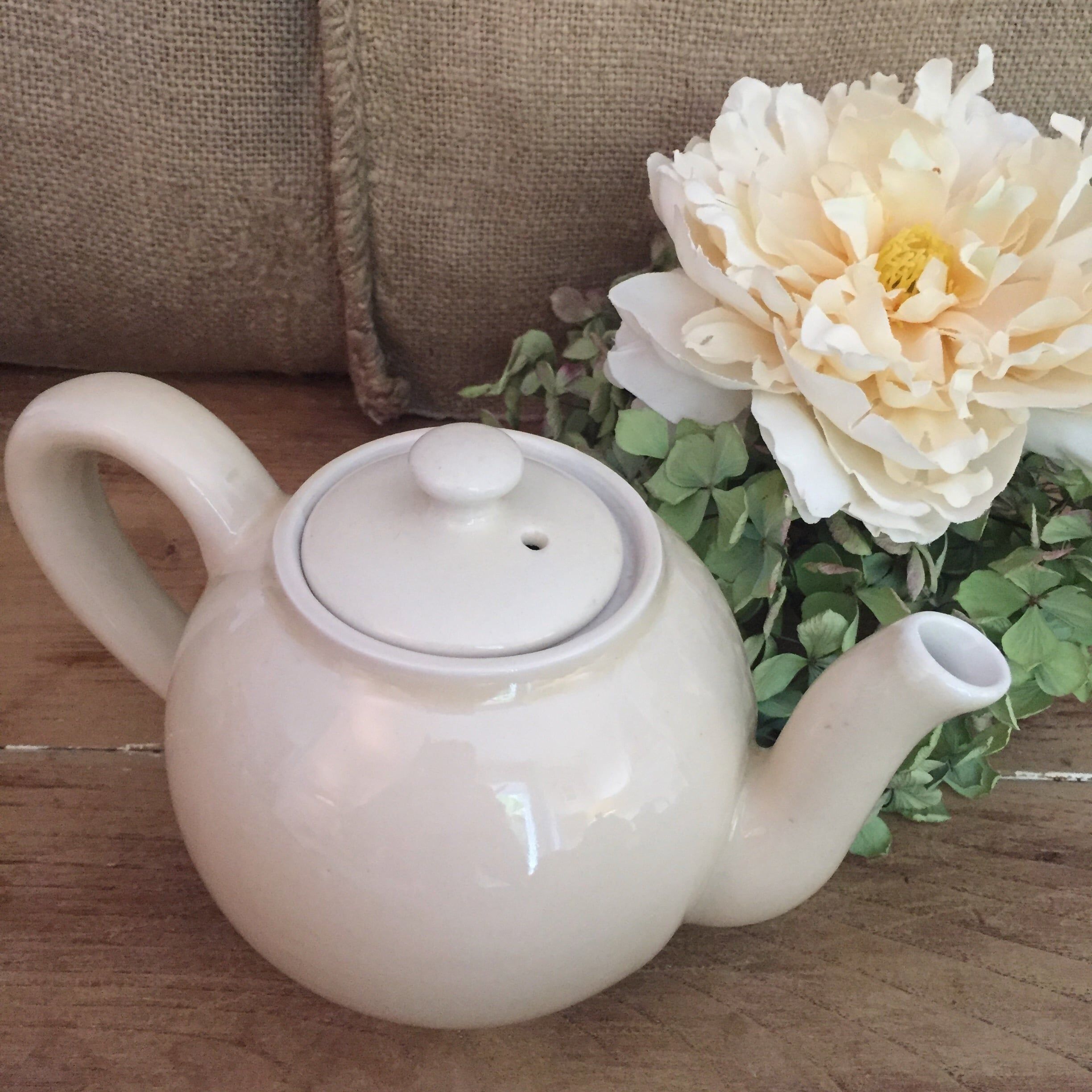 Teapot and vintage milk jar