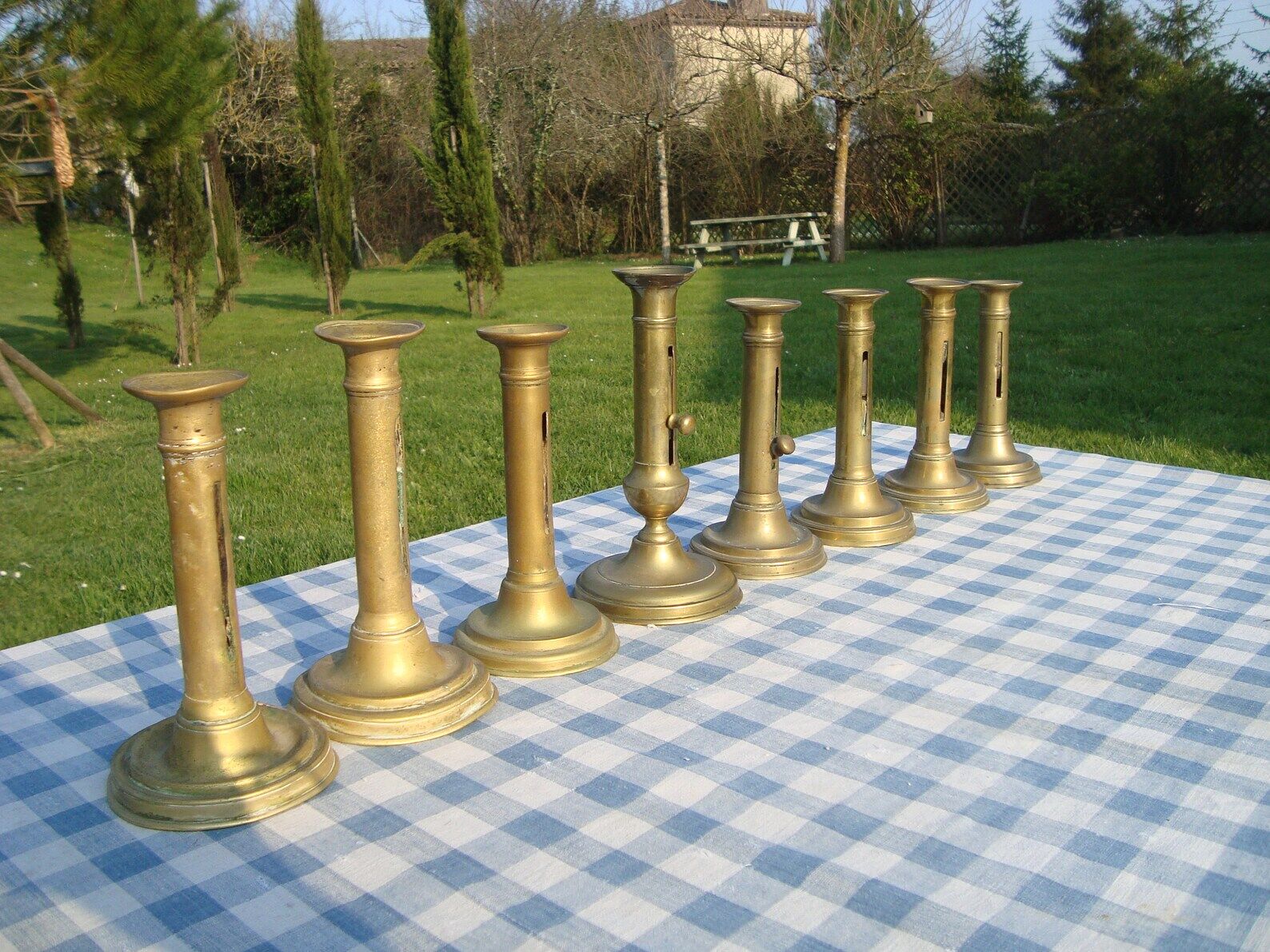 Set of 8 antique brass chandeliers