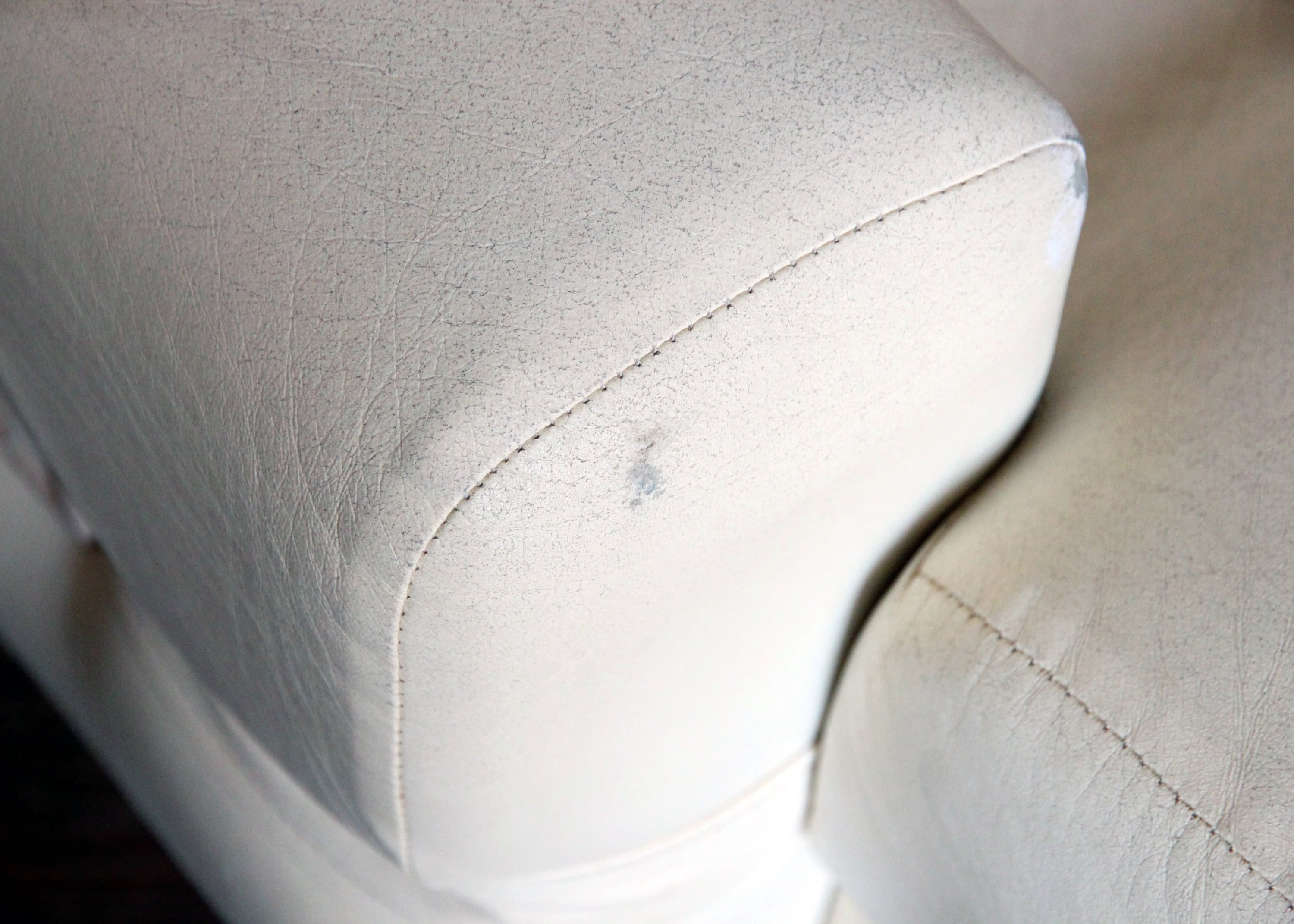 Seventies armchair in cream white skaï