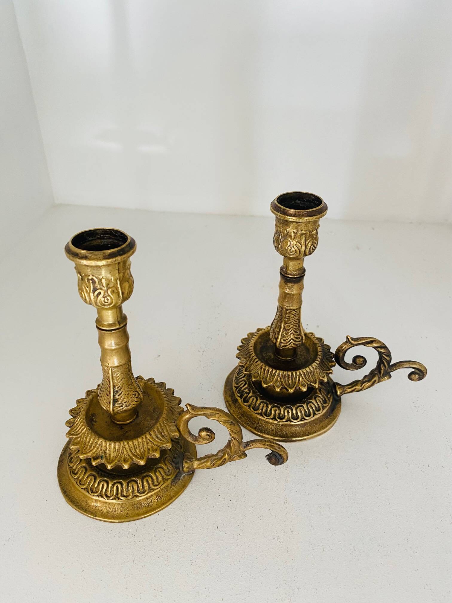 Pair of gilded brass candlesticks
