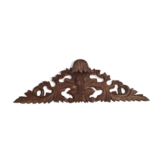 Former finely carved wooden pediment