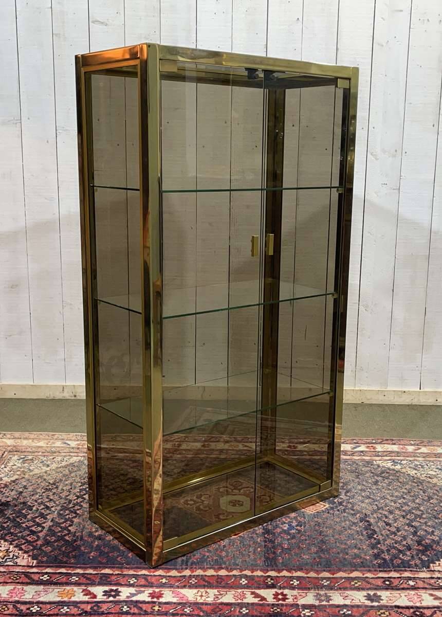 Exhibition showcase in gold-plated chrome and smoked glass - work from the 1980s.