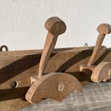 Wooden wall-mounted coat rack