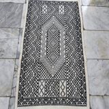 Handwoven black and white rug