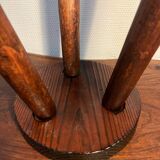 Round wooden tripod stool
