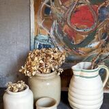 Set of three pots with old condiments in glazed earth