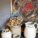 Set of three pots with old condiments in glazed earth