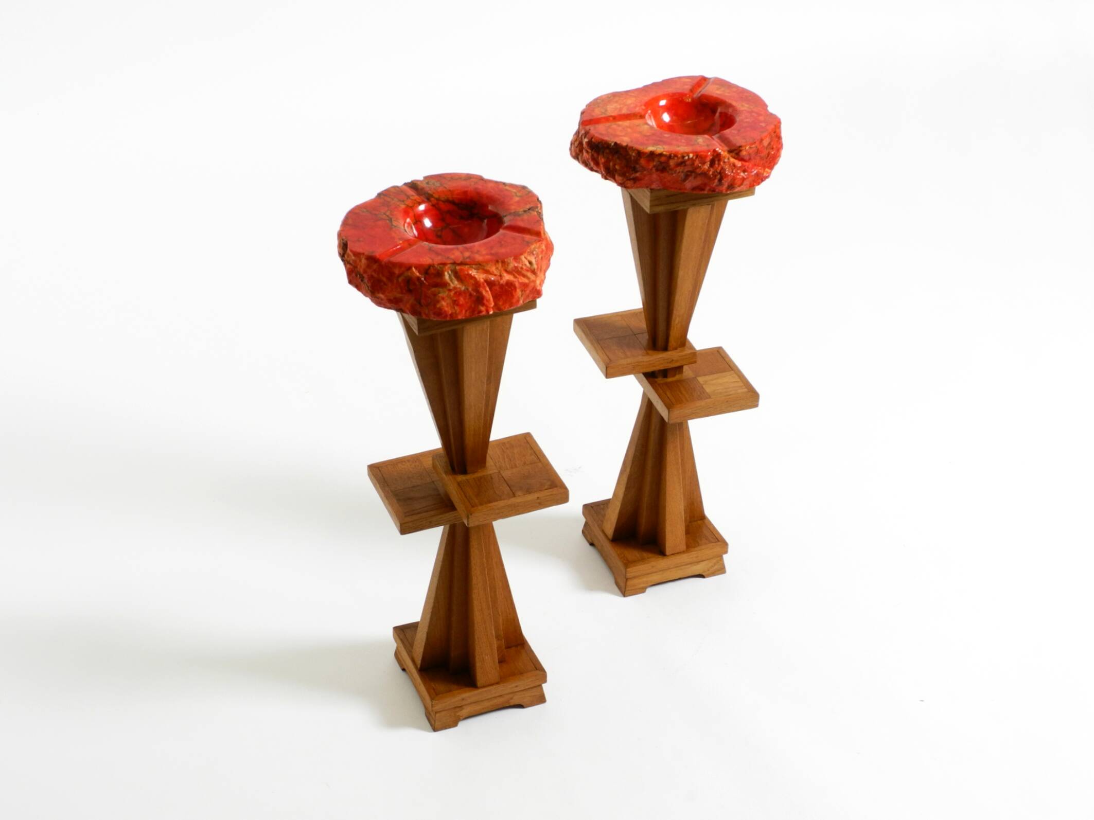 Two mid-century standing ashtrays consisting of red Alabaster cup
