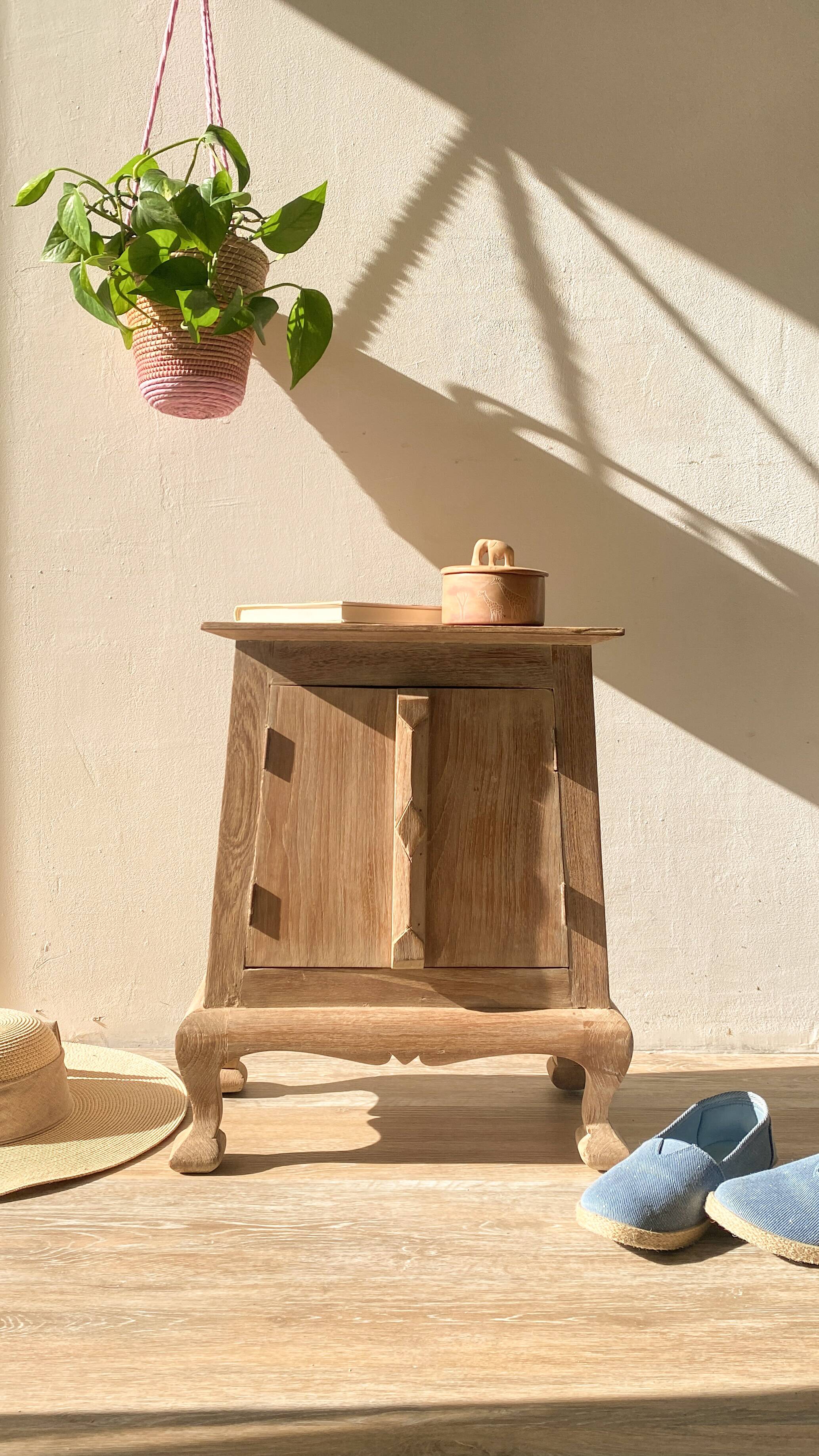 Balinese bedside table in solid carved and limed wood