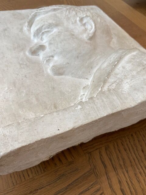 Bust of a man to hang