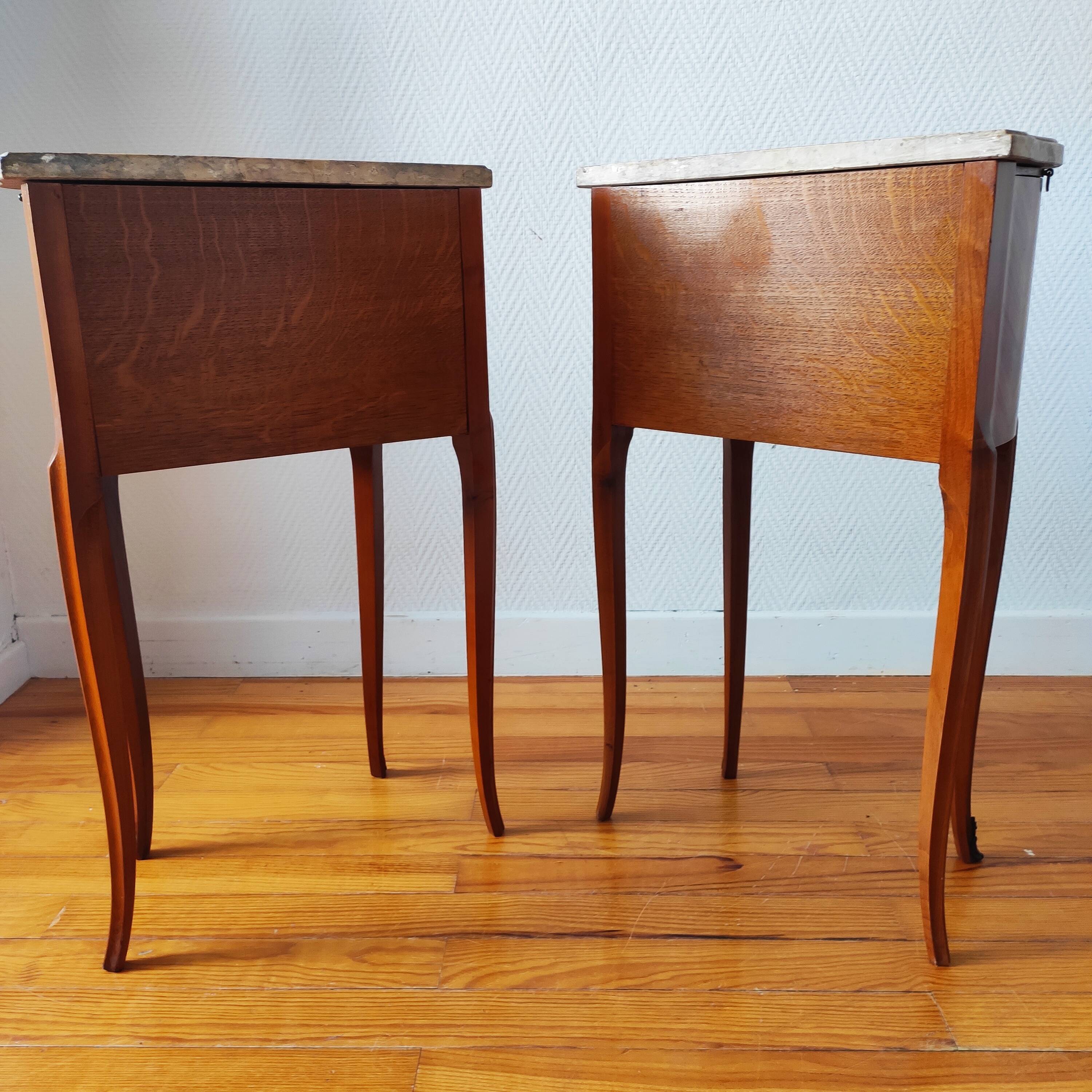 Pair of Louis XV style bedside tables with marquetry and marble.