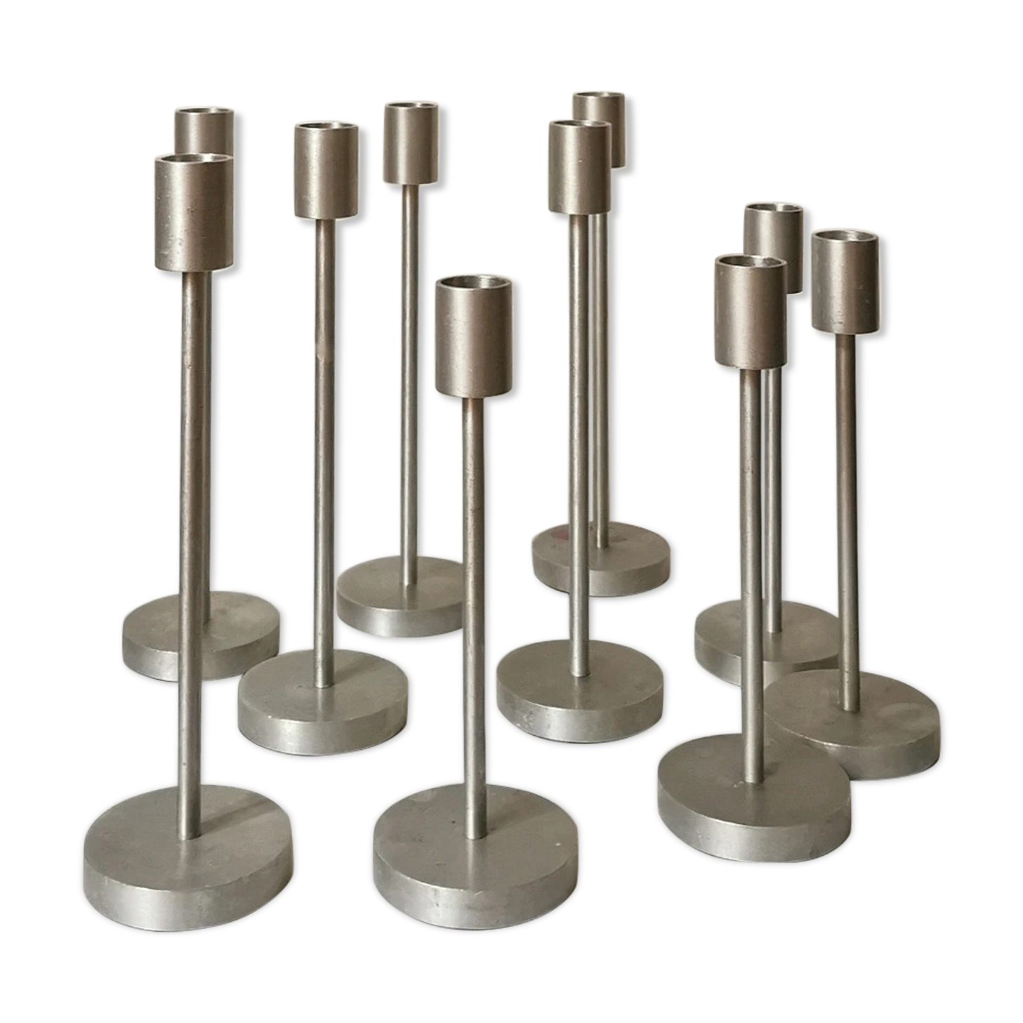 Set of 10 aluminium candle holders.