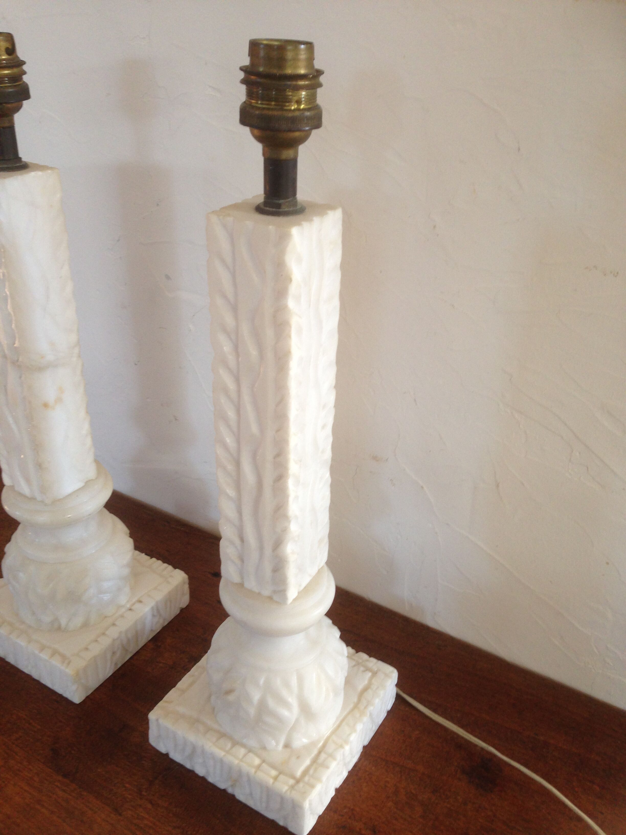Feet of carved Alabaster column lamp