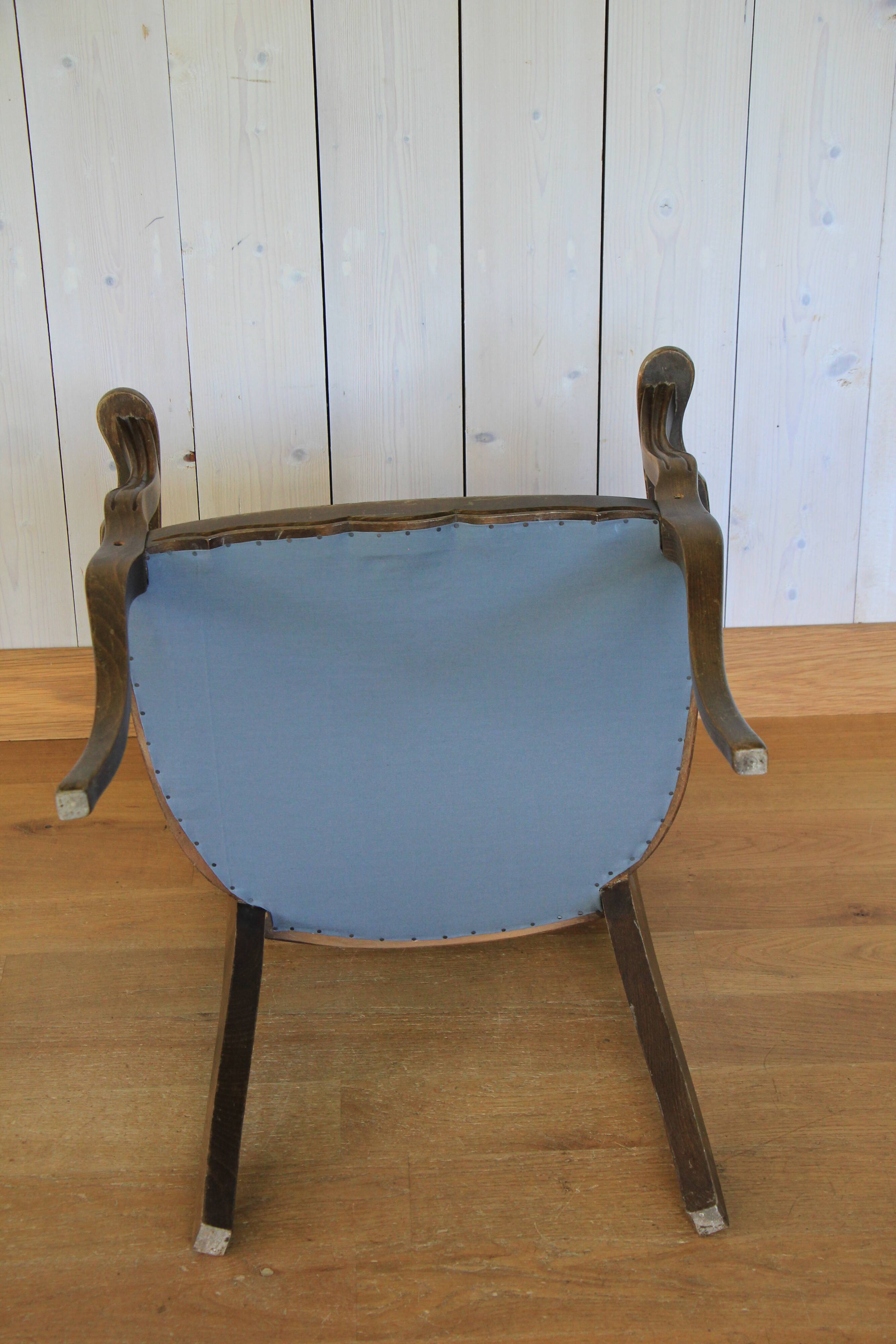 1950s bridge-style armchair