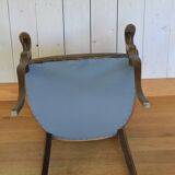1950s bridge-style armchair